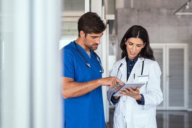 Doctor-and-nurse-discussing-report-1189303565_6880x4584-1