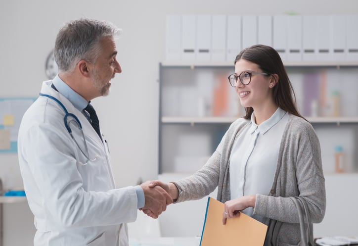 Doctor-and-patient-shaking-hands-670151224_7151x4912