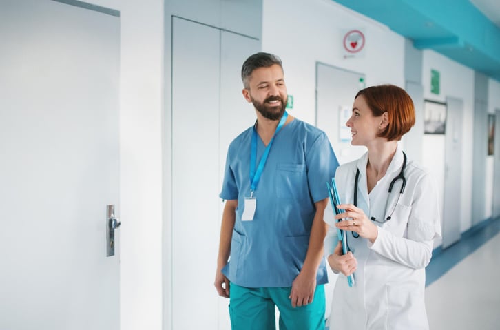 male-european-adult-nurse-hospital-walking-with-doctor-in-hospotal-print